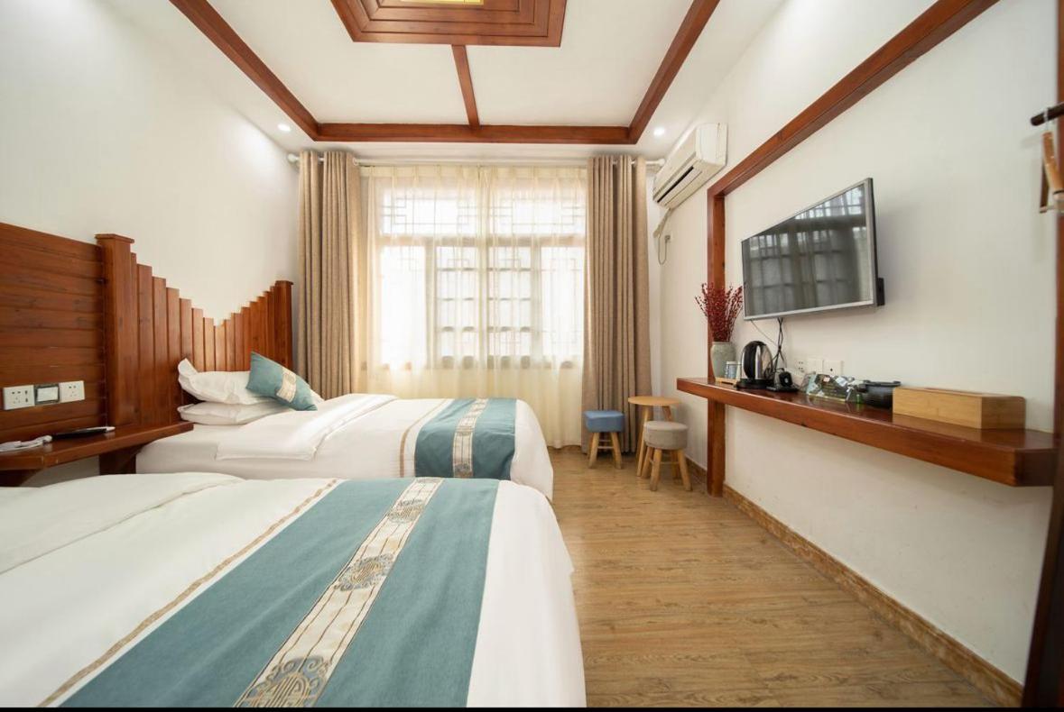 Tea House Hotel จางเจียเจี้ย ภายนอก รูปภาพ